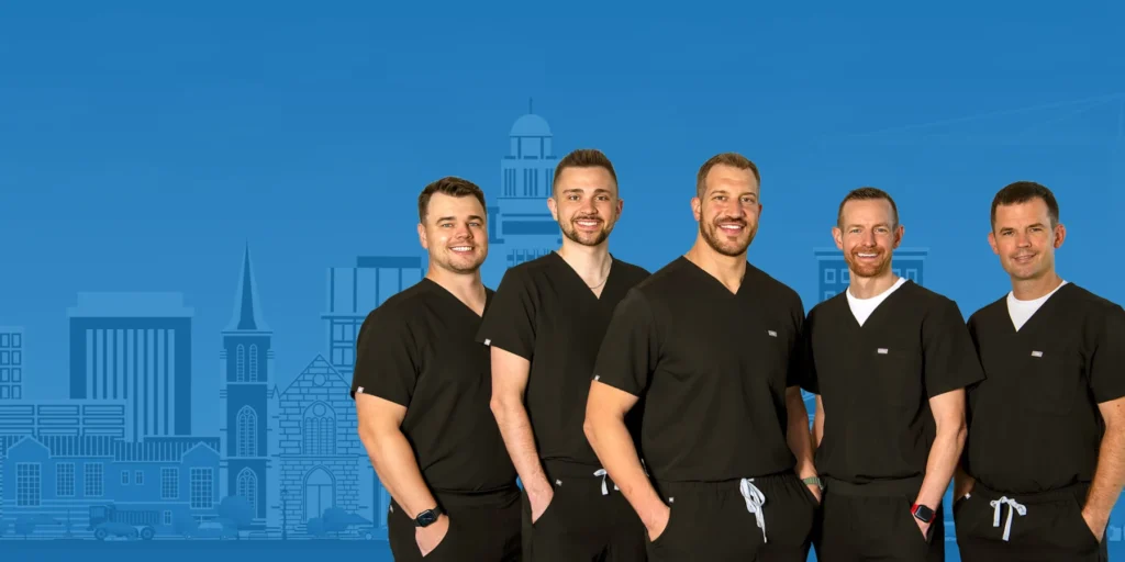 Capital Dental in Lincoln, NE. Dr. Matthew Karloff, Dr. Reese Gebers, Dr. Brandon Chapek, Dr. Addison Killeen, and Dr. Sean Hershberger.